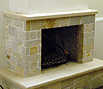 CODE 9: Cast iron fireplace, coated with Kymi stone, Vyzantine type