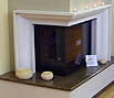 CODE 13: Iron casted, one-sided, energy fireplace, with sliding door, coated with granite and marble