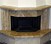 CODE 12: Three-side, iron casted cornered fireplace, coated with marble